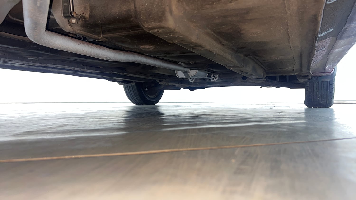 Used 2015 Hyundai Grand i10 Sportz 1.2 Kappa VTVT Petrol Manual extra REAR RIGHT UNDERBODY VIEW