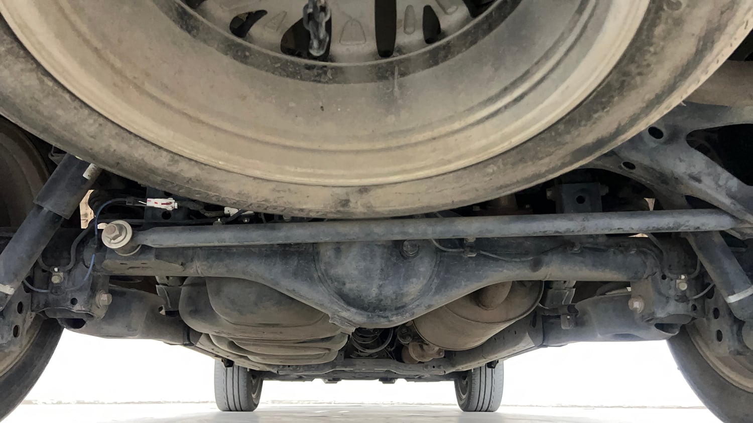Used 2023 Toyota Innova Crysta ZX 2.7 AT 7 STR Petrol Automatic extra REAR UNDERBODY VIEW (TAKEN FROM REAR)