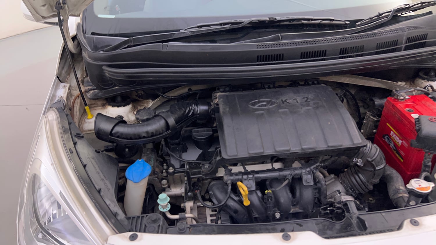 Used 2014 Hyundai Grand i10 Sportz 1.2 Kappa VTVT Petrol Manual engine ENGINE RIGHT SIDE HINGE & APRON VIEW