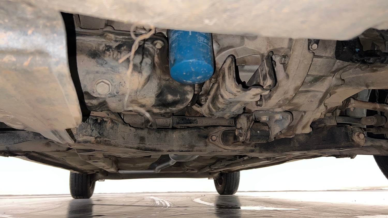 Used 2014 Hyundai Grand i10 Sportz 1.2 Kappa VTVT Petrol Manual extra FRONT LEFT UNDERBODY VIEW