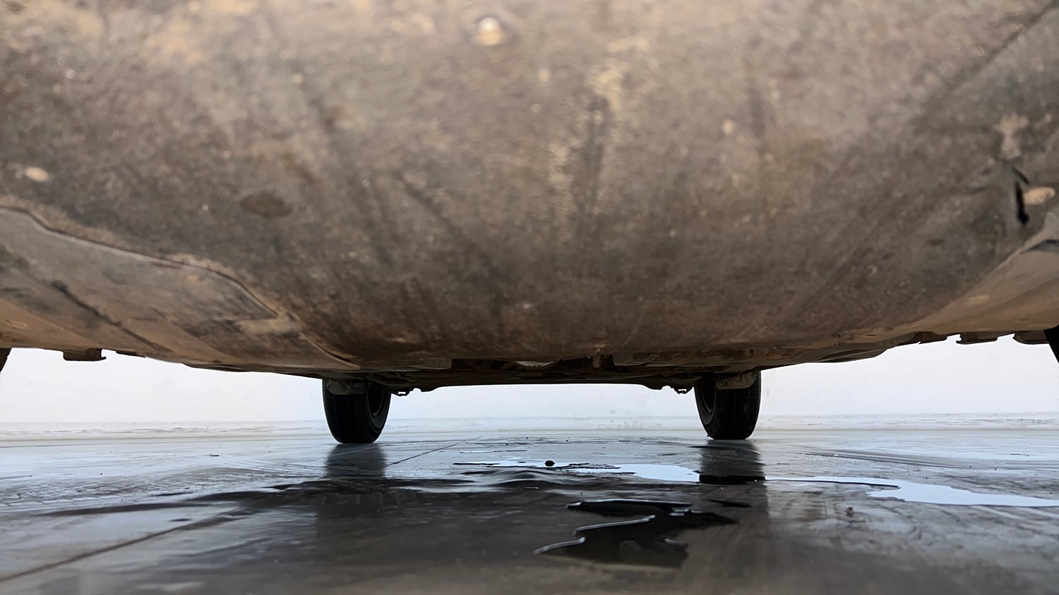 Used 2022 Maruti Suzuki Dzire VXi Petrol Manual extra FRONT LEFT UNDERBODY VIEW