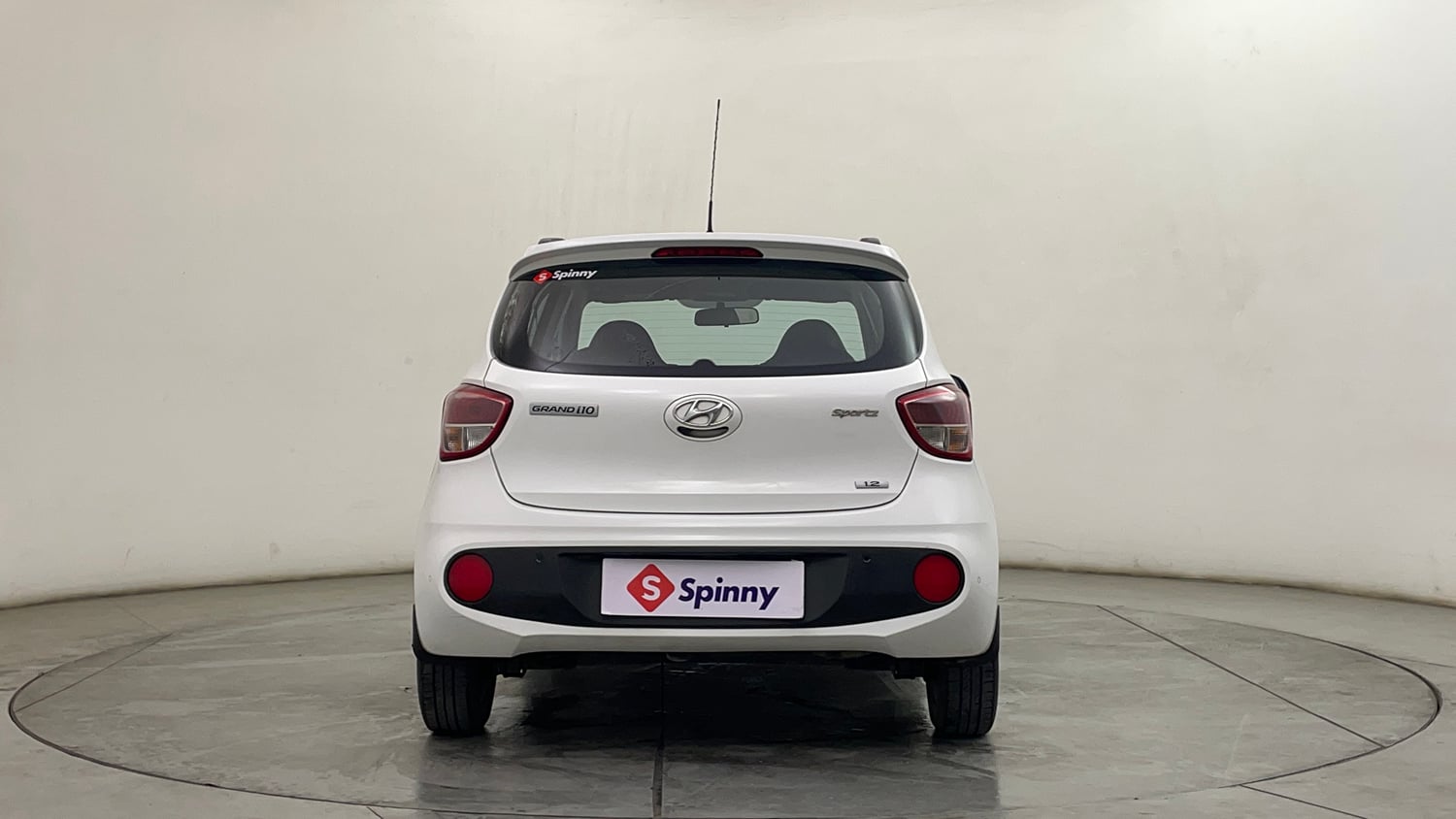 Used 2019 Hyundai Grand i10 Sportz 1.2 Kappa VTVT Petrol Manual exterior BACK VIEW