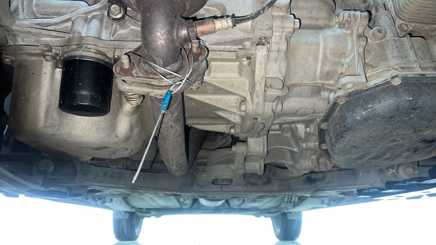 Used 2021 Maruti Suzuki Baleno Zeta Automatic Petrol Automatic extra FRONT LEFT UNDERBODY VIEW
