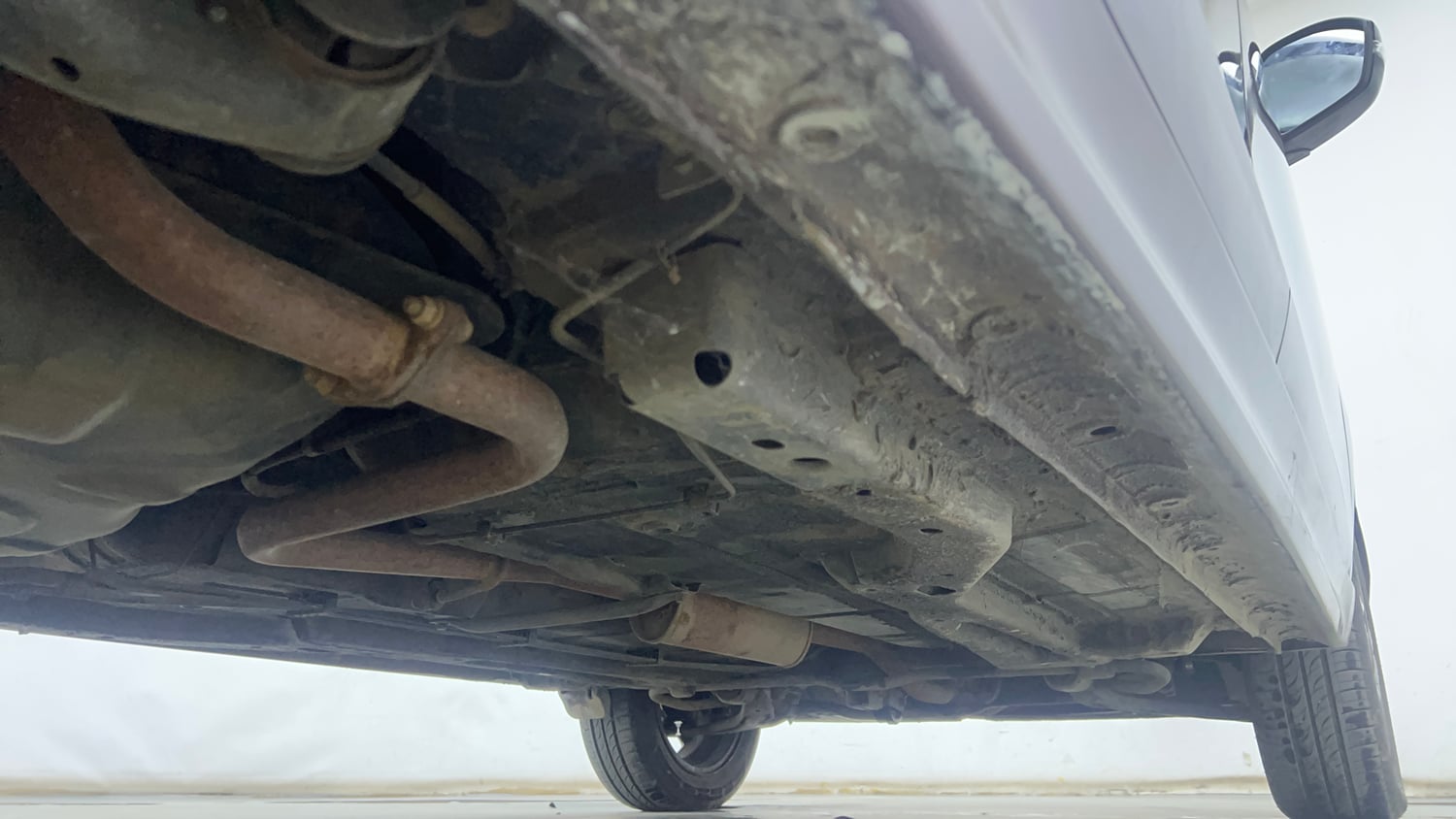 Used 2021 Tata Tigor XZ Plus Petrol Manual extra REAR RIGHT UNDERBODY VIEW