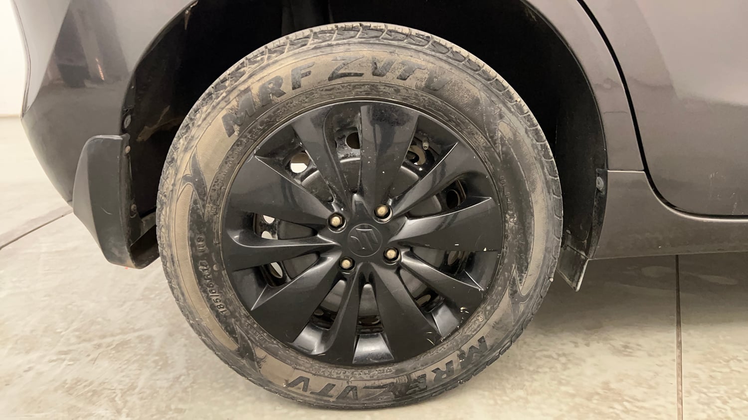 Used 2016 Maruti Suzuki Baleno Delta 1.2 Petrol Manual tyres RIGHT REAR TYRE RIM VIEW