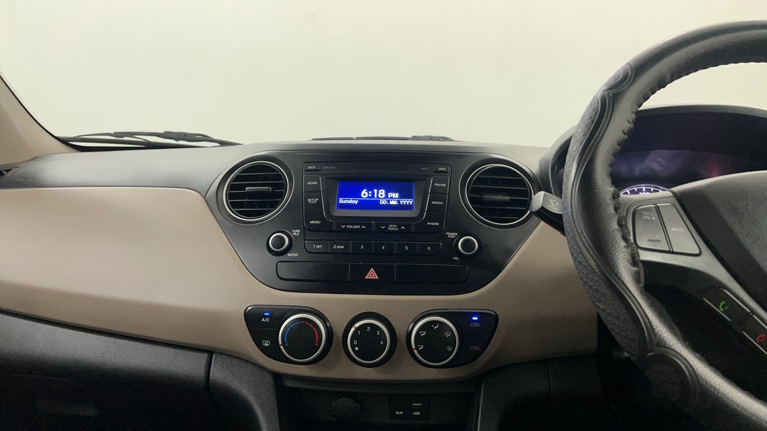Used 2016 Hyundai Grand i10 Sportz 1.2 Kappa VTVT Petrol Manual interior MUSIC SYSTEM & AC CONTROL VIEW
