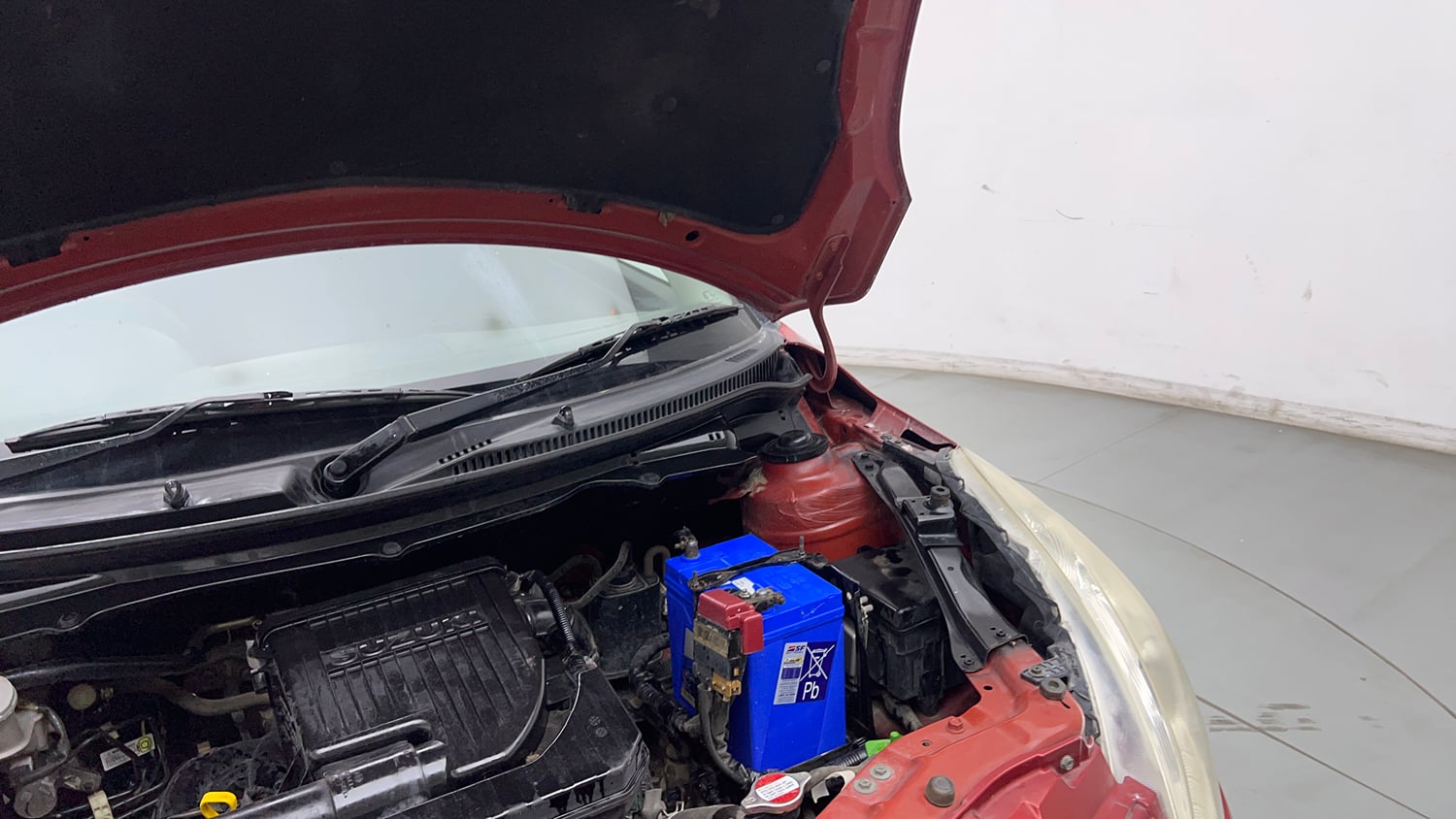 Used 2013 Maruti Suzuki Swift VXi Petrol Manual engine ENGINE LEFT SIDE HINGE & APRON VIEW