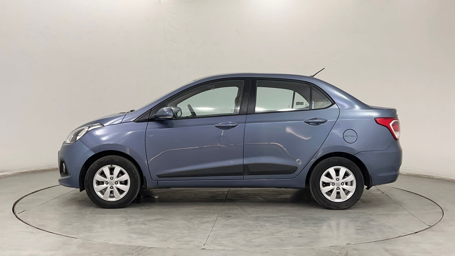 Used 2015 Hyundai Xcent SX 1.2 Petrol Manual exterior LEFT SIDE VIEW