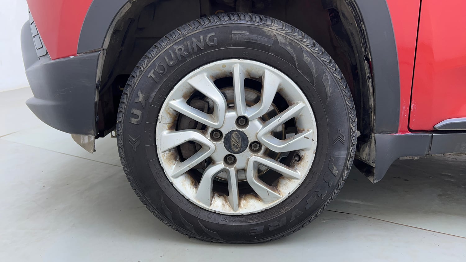 Used 2017 Mahindra KUV100 K6 6 STR Petrol Manual tyres LEFT FRONT TYRE RIM VIEW