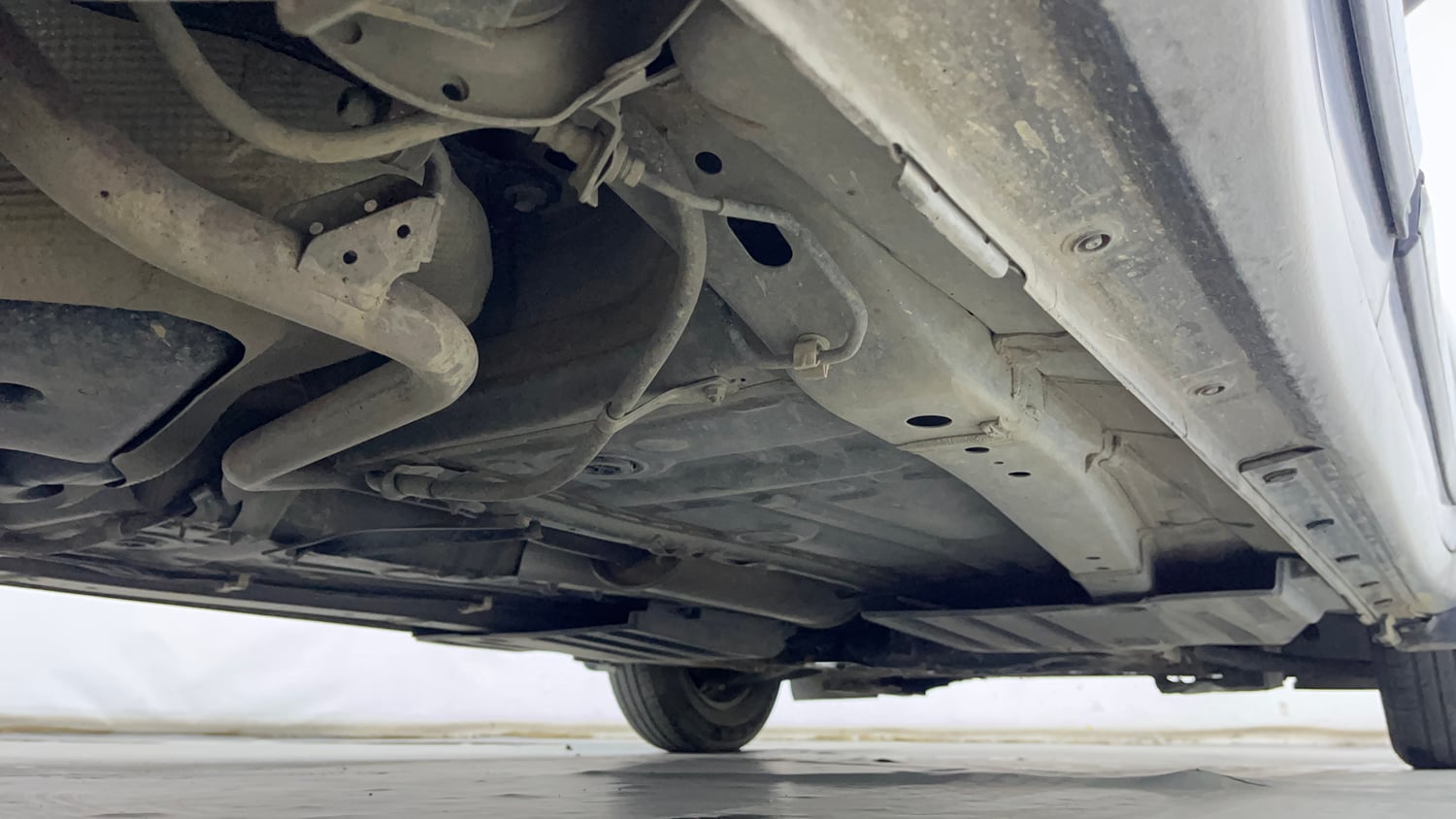 Used 2022 Maruti Suzuki Swift VXi Petrol Manual extra REAR RIGHT UNDERBODY VIEW