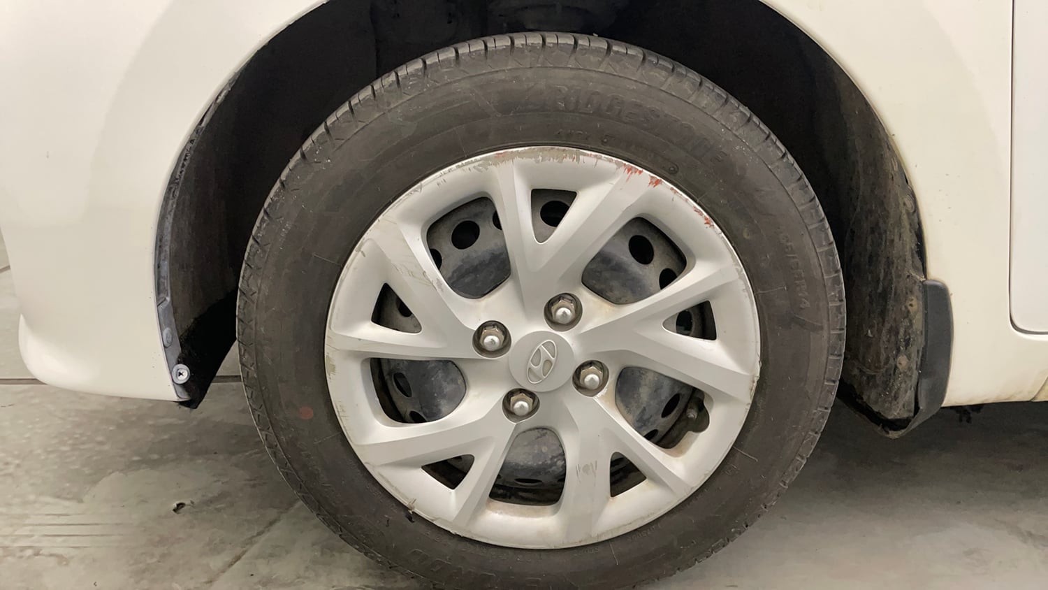 Used 2019 Hyundai Grand i10 Sportz 1.2 Kappa VTVT Petrol Manual tyres LEFT FRONT TYRE RIM VIEW