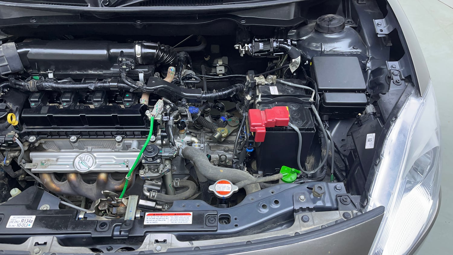 Used 2022 Maruti Suzuki Swift VXi Petrol Manual engine ENGINE LEFT SIDE VIEW