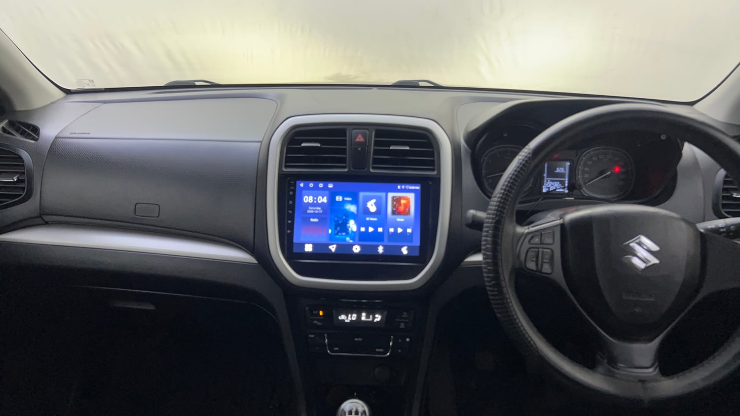 Used 2022 maruti-suzuki Vitara Brezza VXi Petrol Manual interior MUSIC SYSTEM & AC CONTROL VIEW