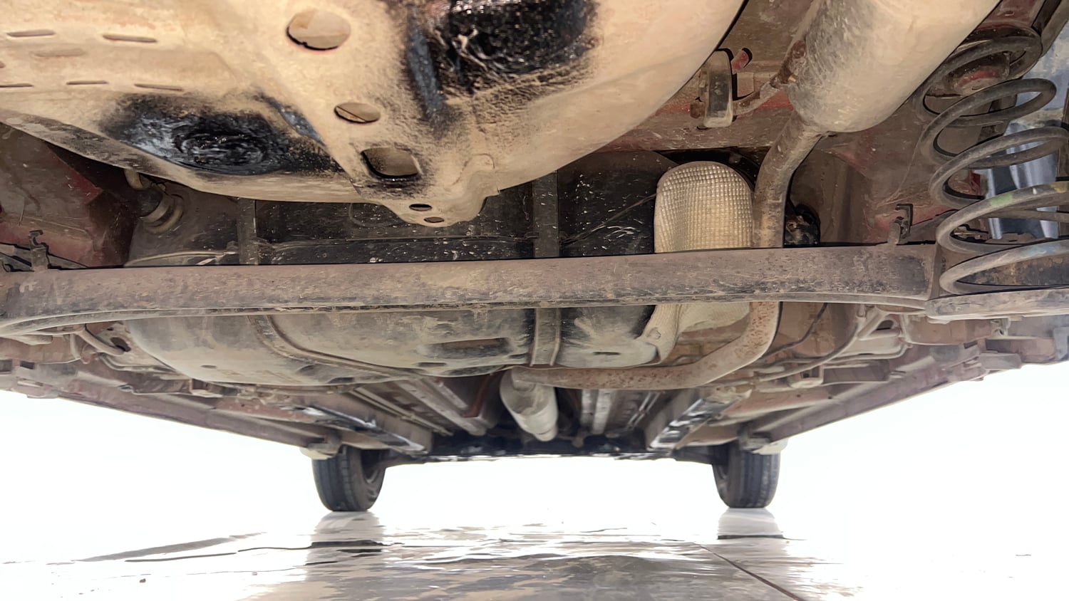 Used 2013 Maruti Suzuki Swift VXi Petrol Manual extra REAR UNDERBODY VIEW (TAKEN FROM REAR)
