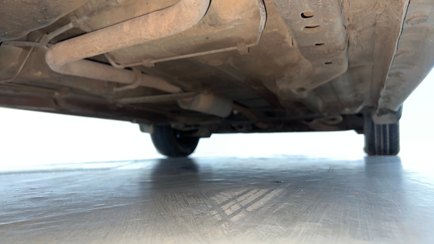 Used 2021 Tata Tigor XMA Petrol Automatic extra REAR RIGHT UNDERBODY VIEW