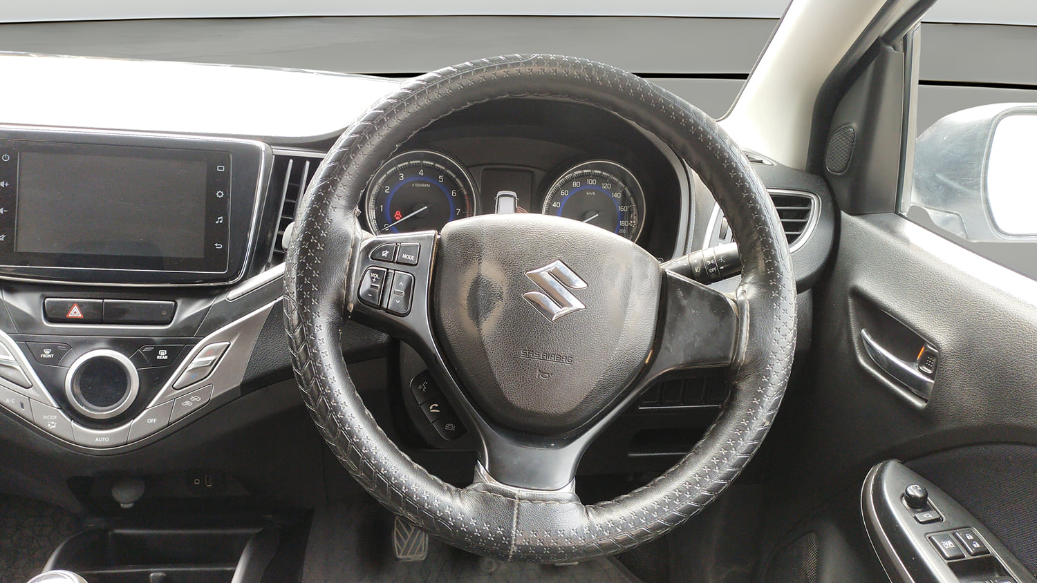 Used 2021 Maruti Suzuki Baleno Zeta Petrol Manual interior STEERING VIEW