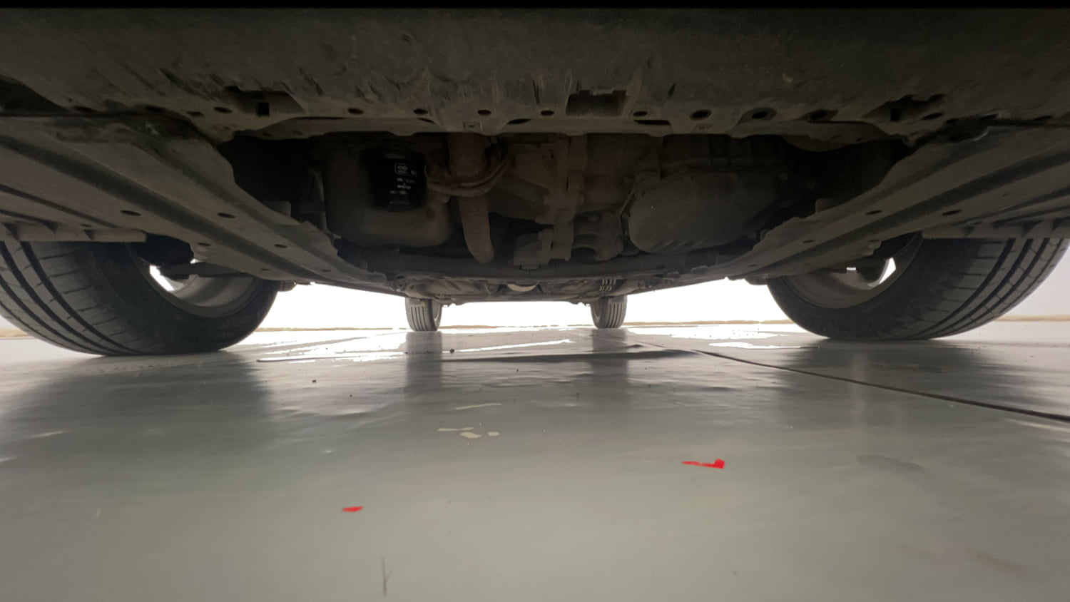 Used 2018 Maruti Suzuki Baleno Zeta 1.2 AT Petrol Automatic extra FRONT LEFT UNDERBODY VIEW