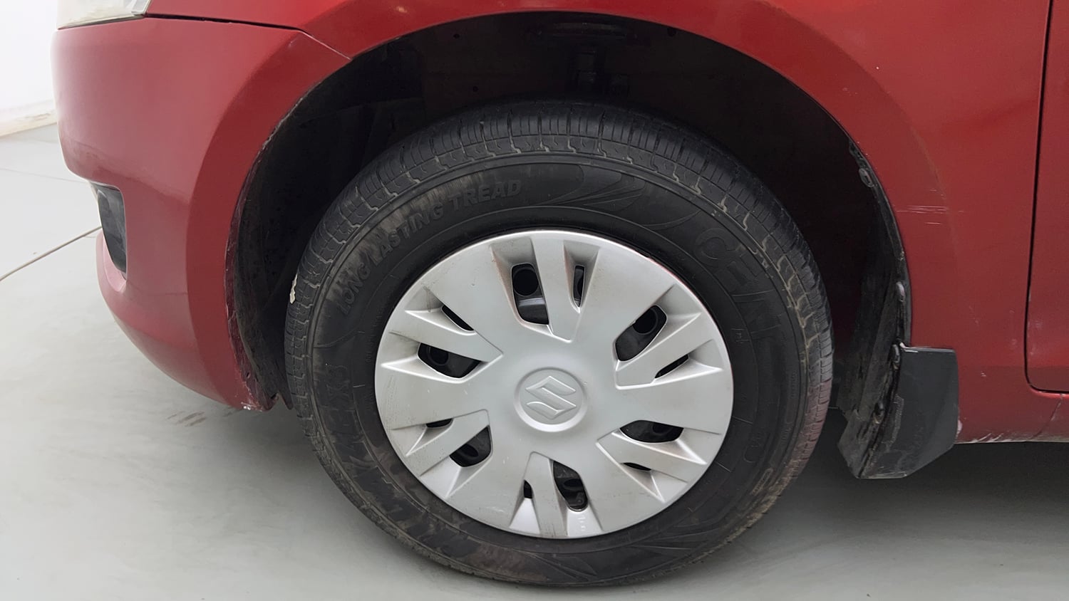 Used 2013 Maruti Suzuki Swift VXi Petrol Manual tyres LEFT FRONT TYRE RIM VIEW