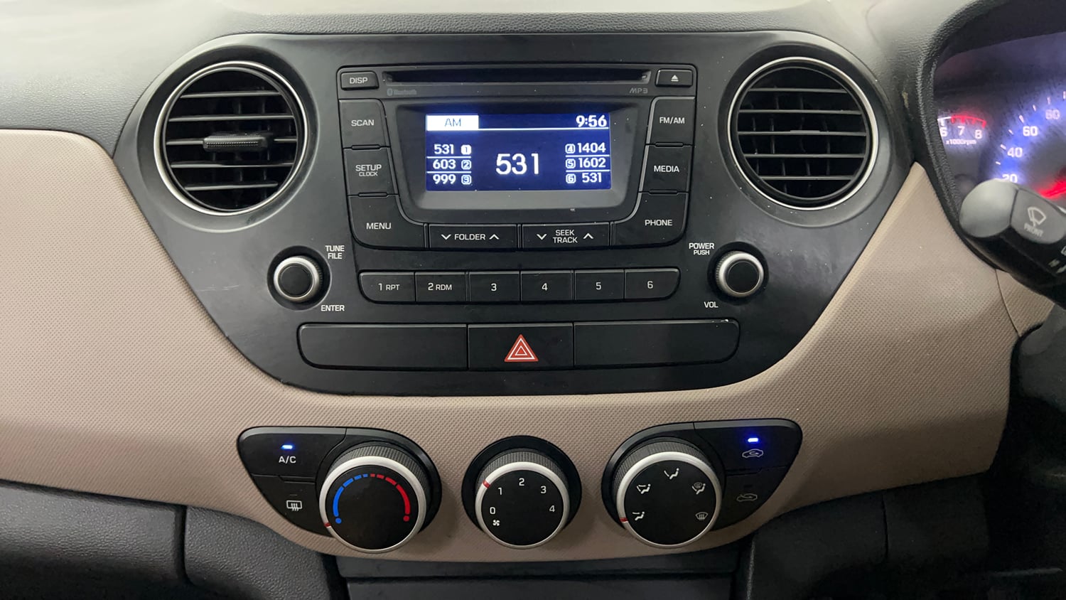 Used 2015 Hyundai Xcent SX 1.2 Petrol Manual interior MUSIC SYSTEM & AC CONTROL VIEW