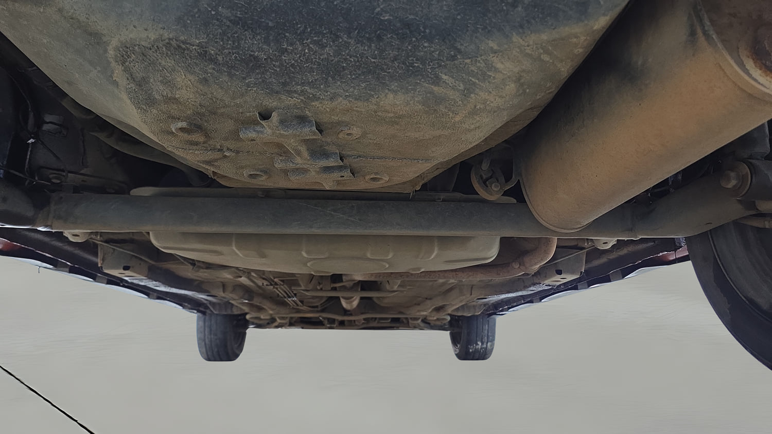 Used 2021 Tata Tiago NRG XZ MT Petrol Manual extra REAR UNDERBODY VIEW (TAKEN FROM REAR)