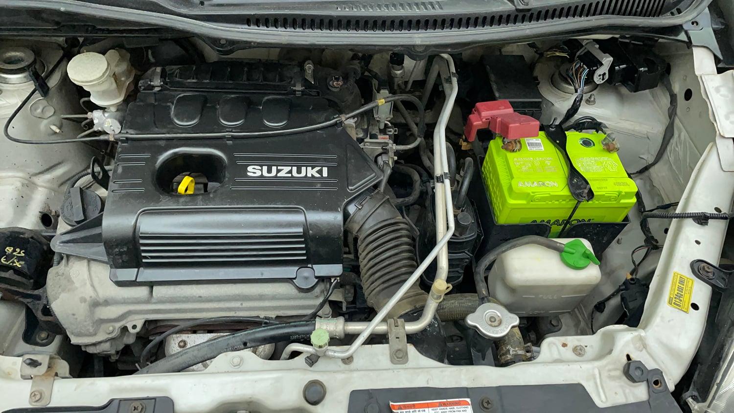 Used 2012 Maruti Suzuki Wagon R LXi Petrol Manual engine ENGINE LEFT SIDE VIEW