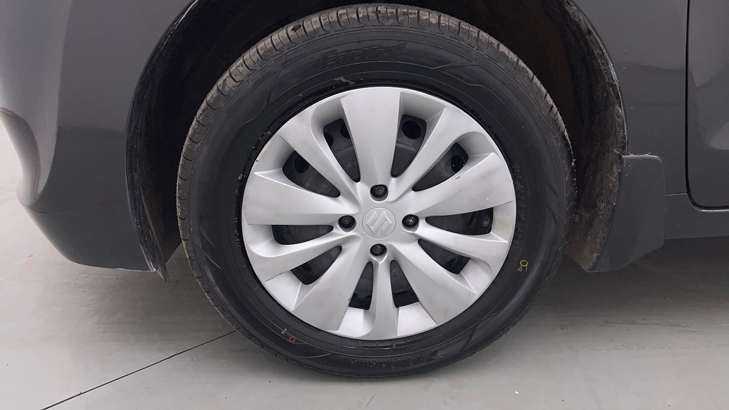 Used 2018 Maruti Suzuki Baleno Delta 1.2 Petrol Manual tyres LEFT FRONT TYRE RIM VIEW