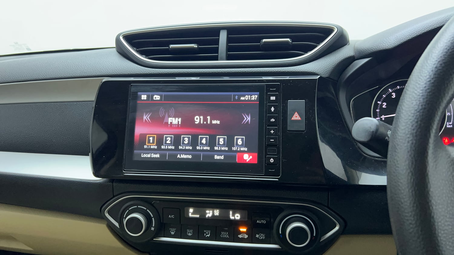 Used 2024 honda Amaze 2nd Generation VX 1.2 Petrol MT Petrol Manual top_features Integrated (in-dash) music system