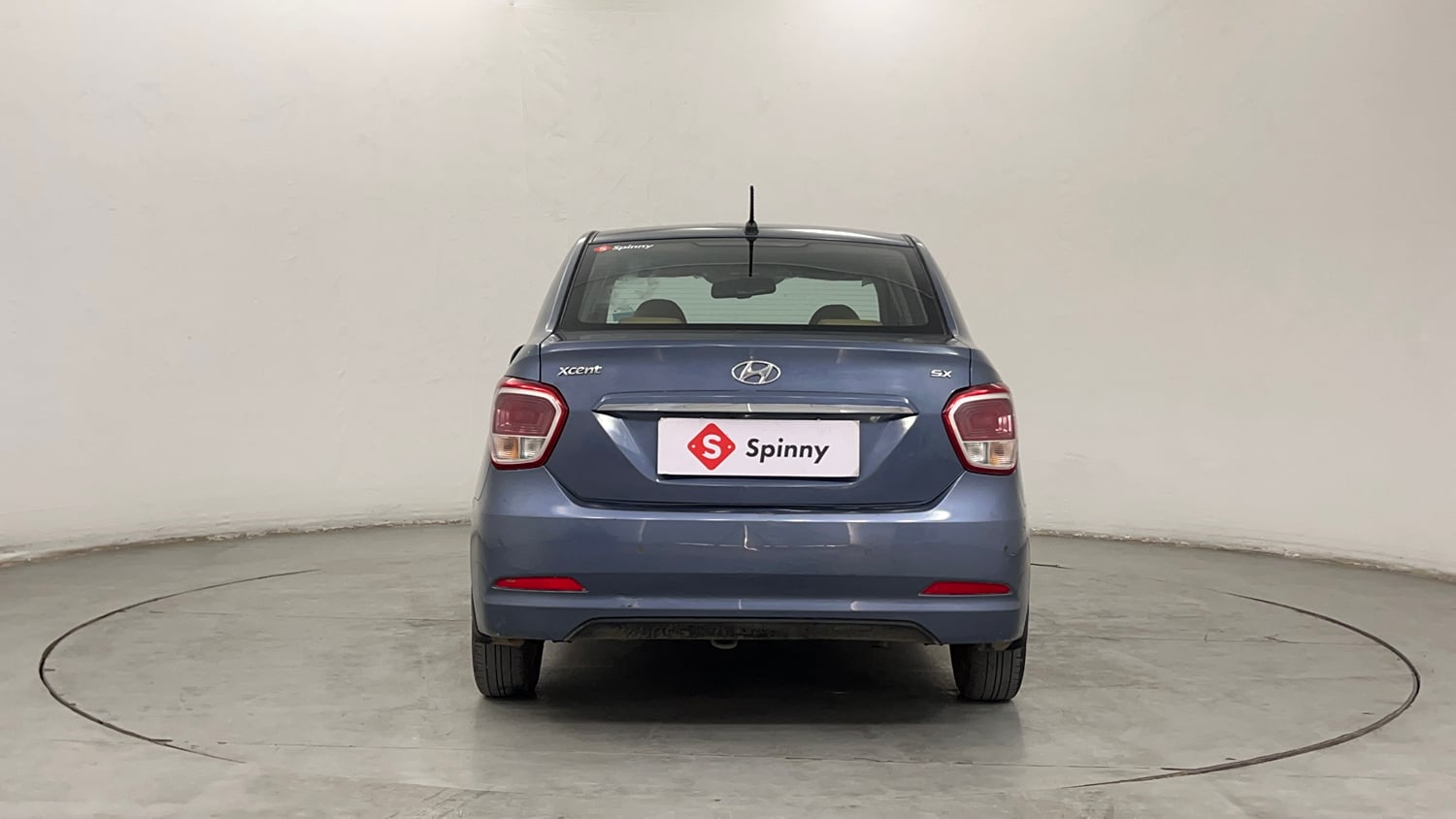 Used 2015 Hyundai Xcent SX 1.2 Petrol Manual exterior BACK VIEW