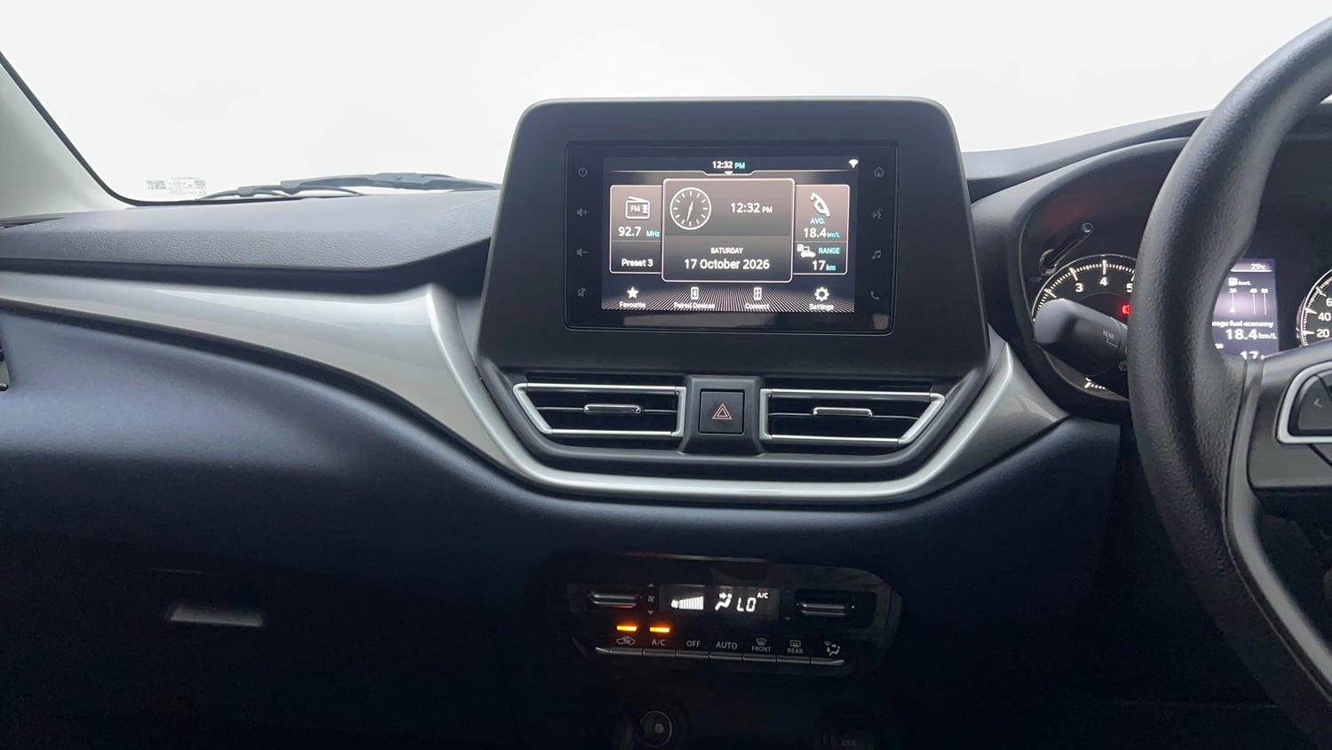 Used 2025 Maruti Suzuki Baleno Zeta MT Petrol Manual top_features Integrated (in-dash) music system