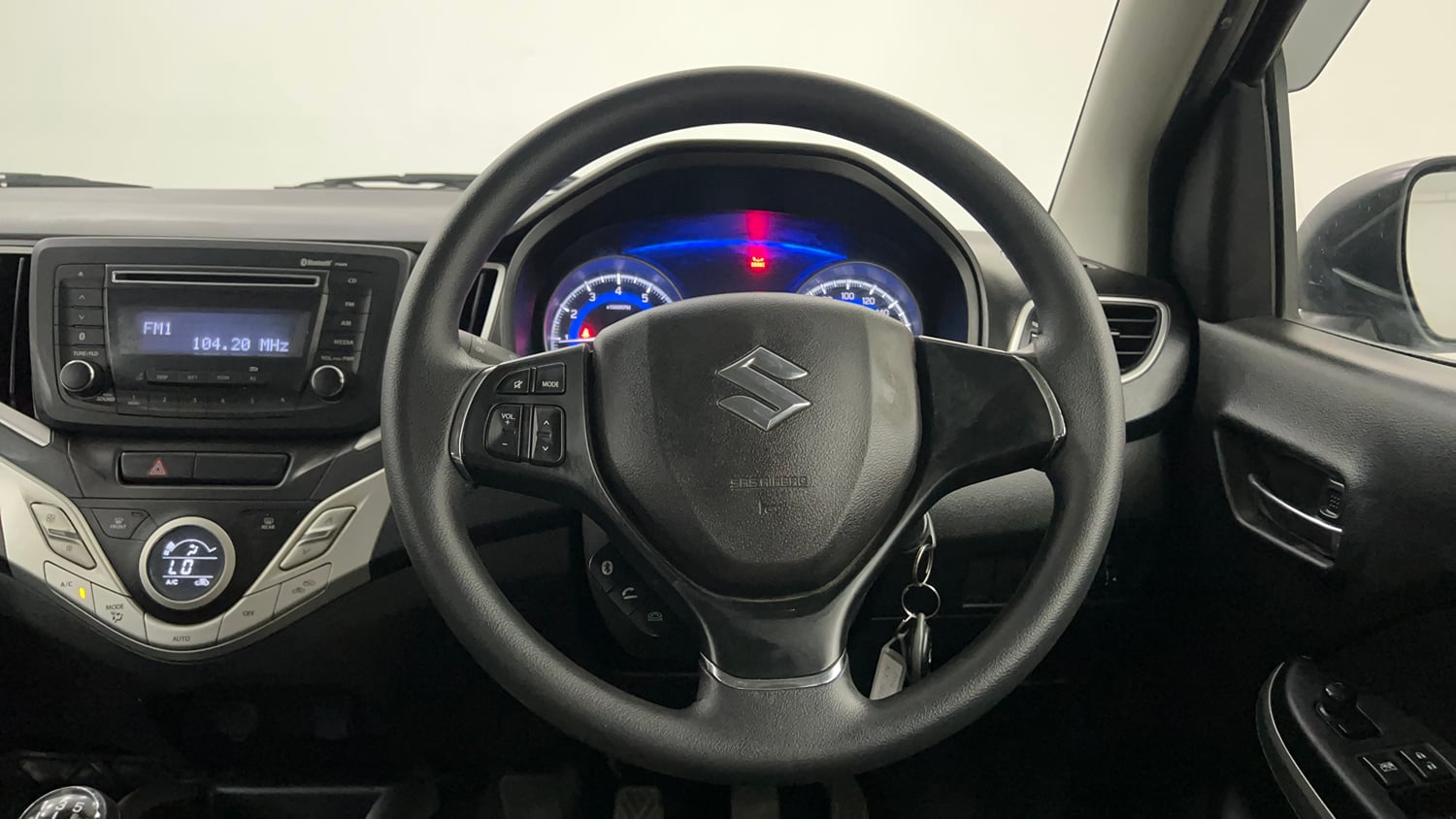 Used 2016 Maruti Suzuki Baleno Delta 1.2 Petrol Manual interior STEERING VIEW