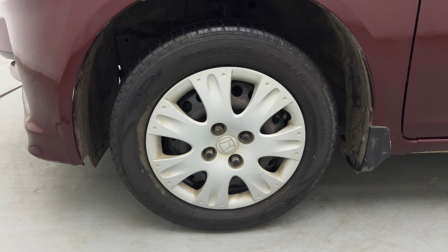 Used 2015 Honda Amaze 1.2 S i-VTEC Petrol Manual tyres LEFT FRONT TYRE RIM VIEW