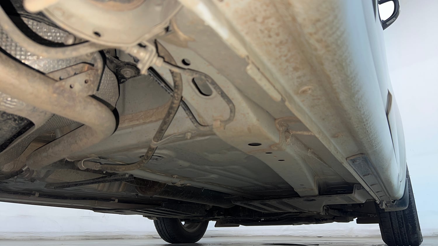 Used 2024 Maruti Suzuki Swift ZXi AMT Petrol Automatic extra REAR RIGHT UNDERBODY VIEW