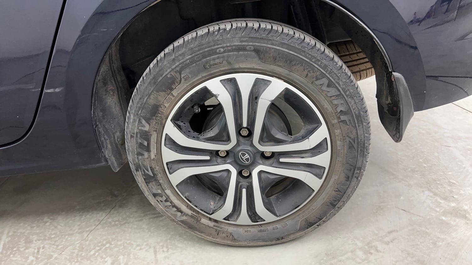 Used 2024 Tata Tigor XZA iCNG Cng Automatic tyres LEFT REAR TYRE RIM VIEW