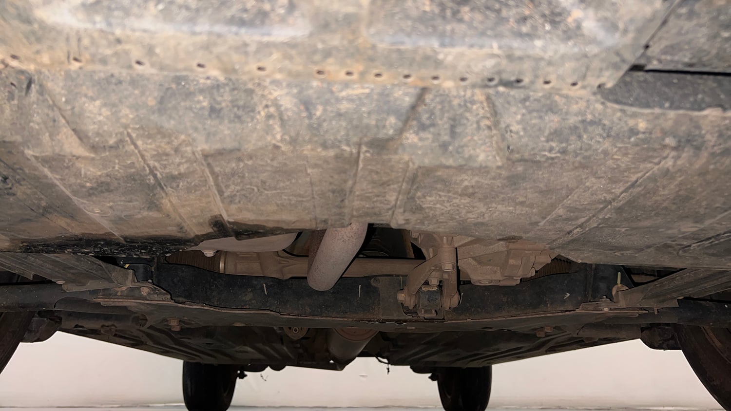 Used 2024 Maruti Suzuki Grand Vitara Delta Smart Hybrid Petrol Manual extra FRONT LEFT UNDERBODY VIEW