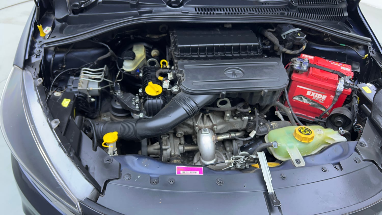 Used 2021 Tata Tigor XMA Petrol Automatic engine ENGINE RIGHT SIDE VIEW