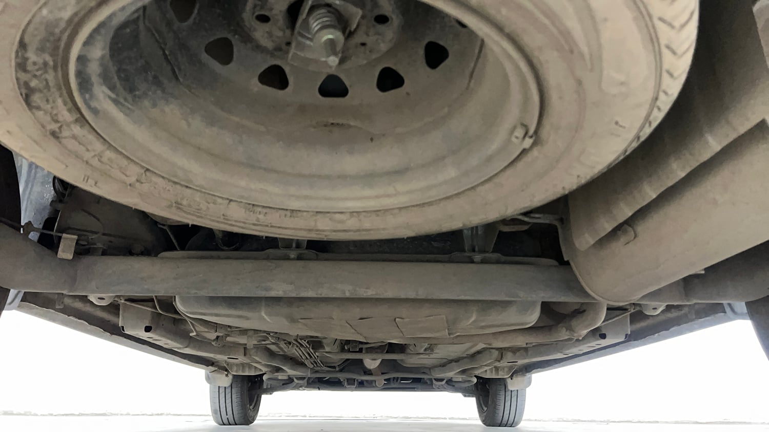 Used 2024 Tata Tigor XZA iCNG Cng Automatic extra REAR UNDERBODY VIEW (TAKEN FROM REAR)