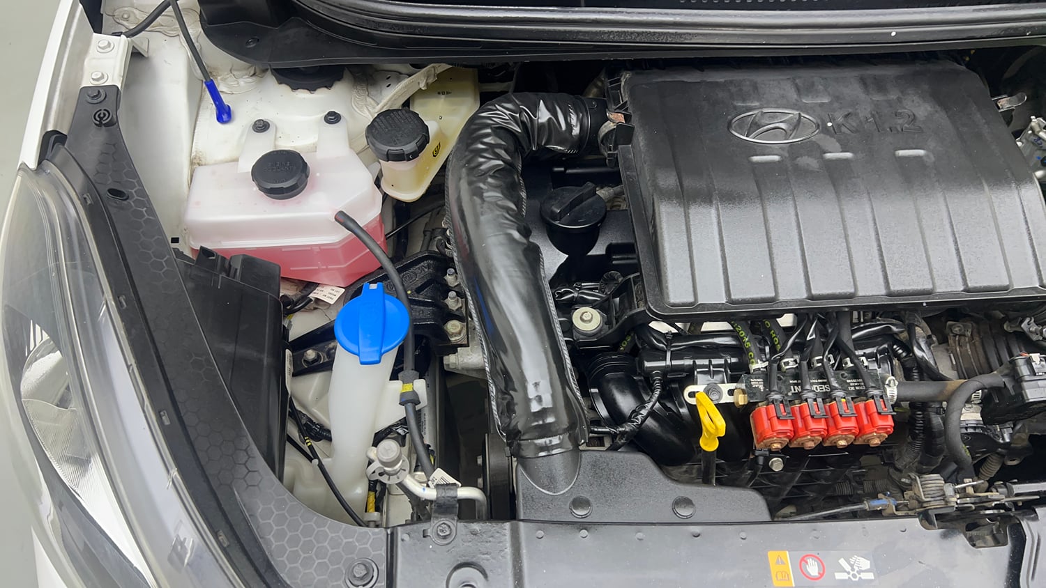 Used 2024 Hyundai Grand i10 Nios Magna 1.2 Kappa Petrol+CNG (Outside Fitted) Cng Manual engine ENGINE RIGHT SIDE VIEW
