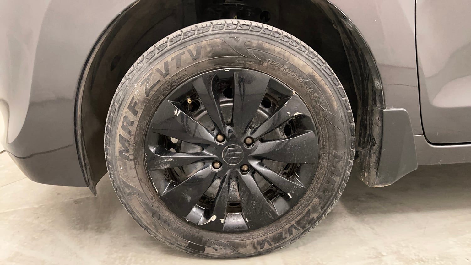 Used 2016 Maruti Suzuki Baleno Delta 1.2 Petrol Manual tyres LEFT FRONT TYRE RIM VIEW