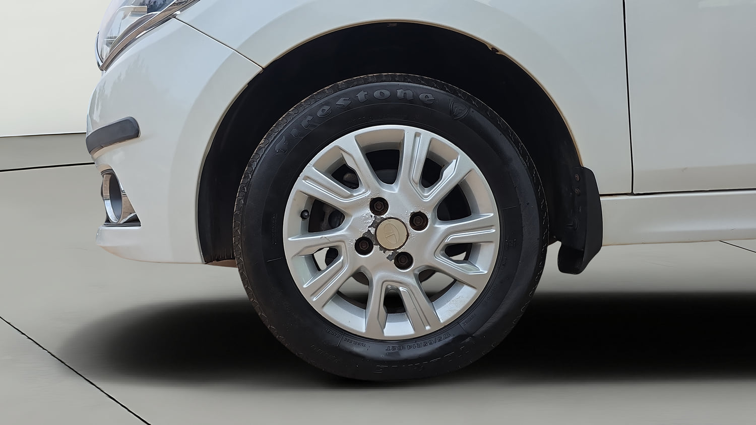Used 2017 Tata Tiago Revotron XZ Petrol Manual tyres LEFT FRONT TYRE RIM VIEW