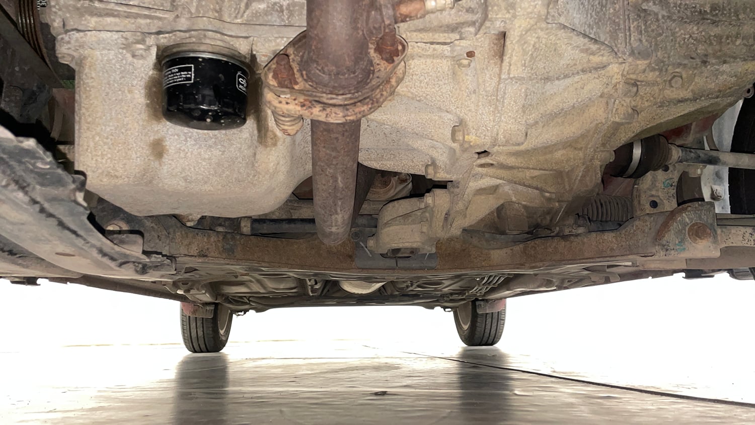 Used 2017 Maruti Suzuki Dzire ZXi AMT Petrol Automatic extra FRONT LEFT UNDERBODY VIEW