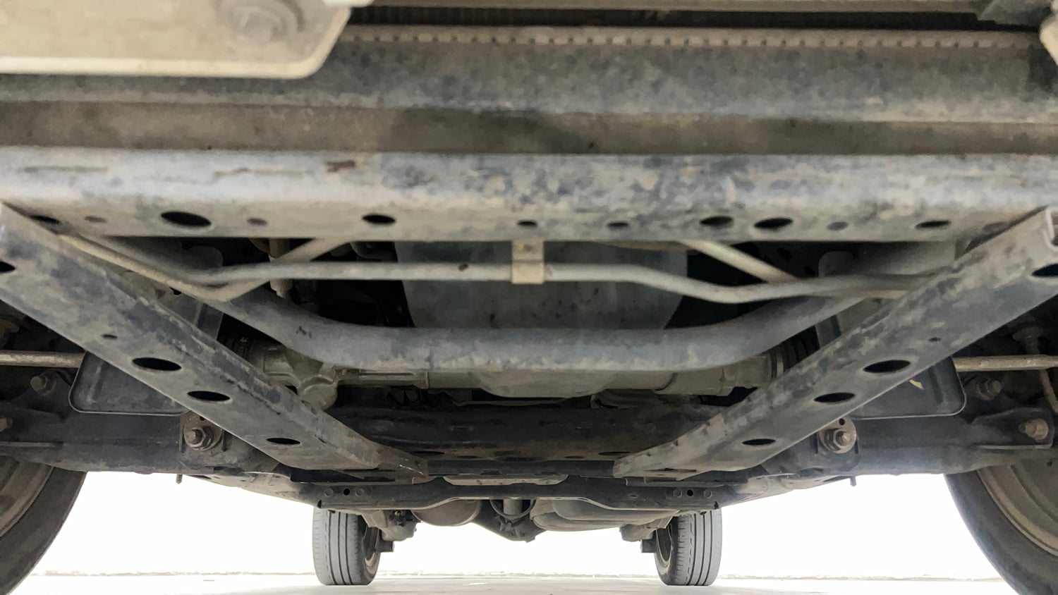 Used 2023 Toyota Innova Crysta ZX 2.7 AT 7 STR Petrol Automatic extra FRONT LEFT UNDERBODY VIEW