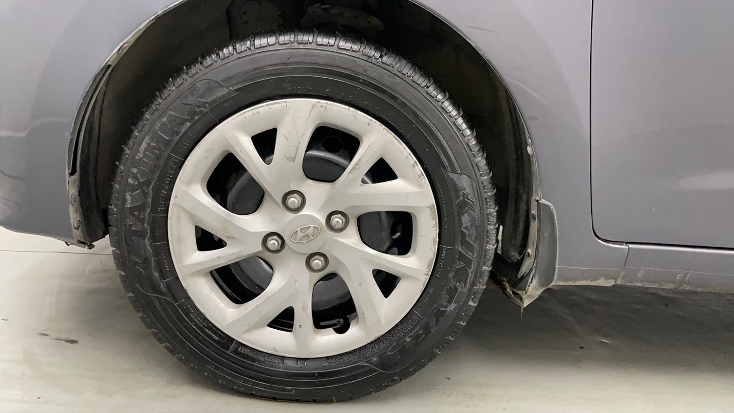 Used 2018 Hyundai Grand i10 Magna 1.2 Kappa VTVT Petrol Manual tyres LEFT FRONT TYRE RIM VIEW