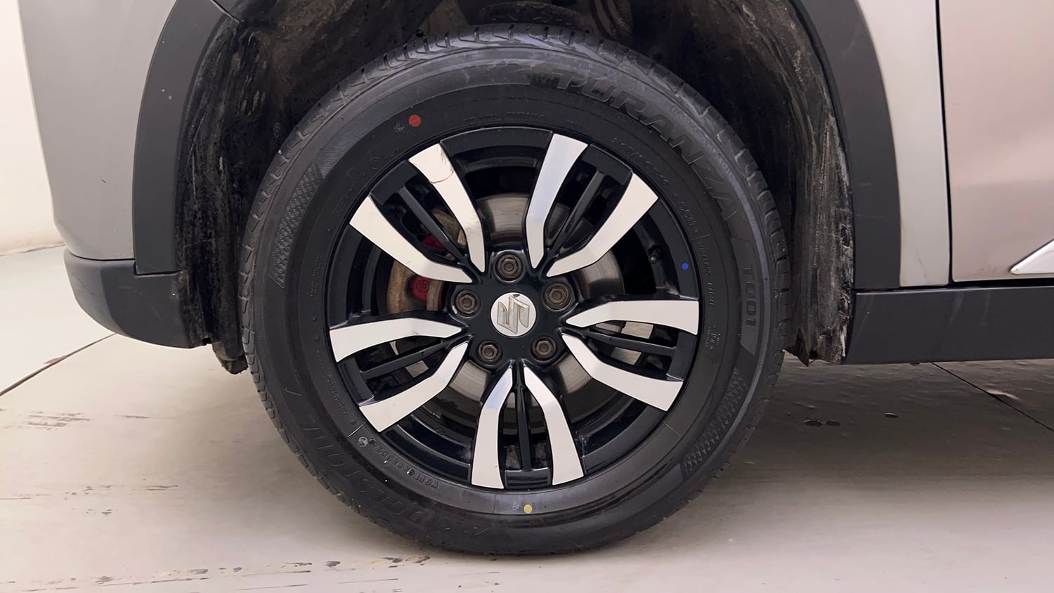Used 2022 maruti-suzuki Vitara Brezza VXi Petrol Manual tyres LEFT FRONT TYRE RIM VIEW