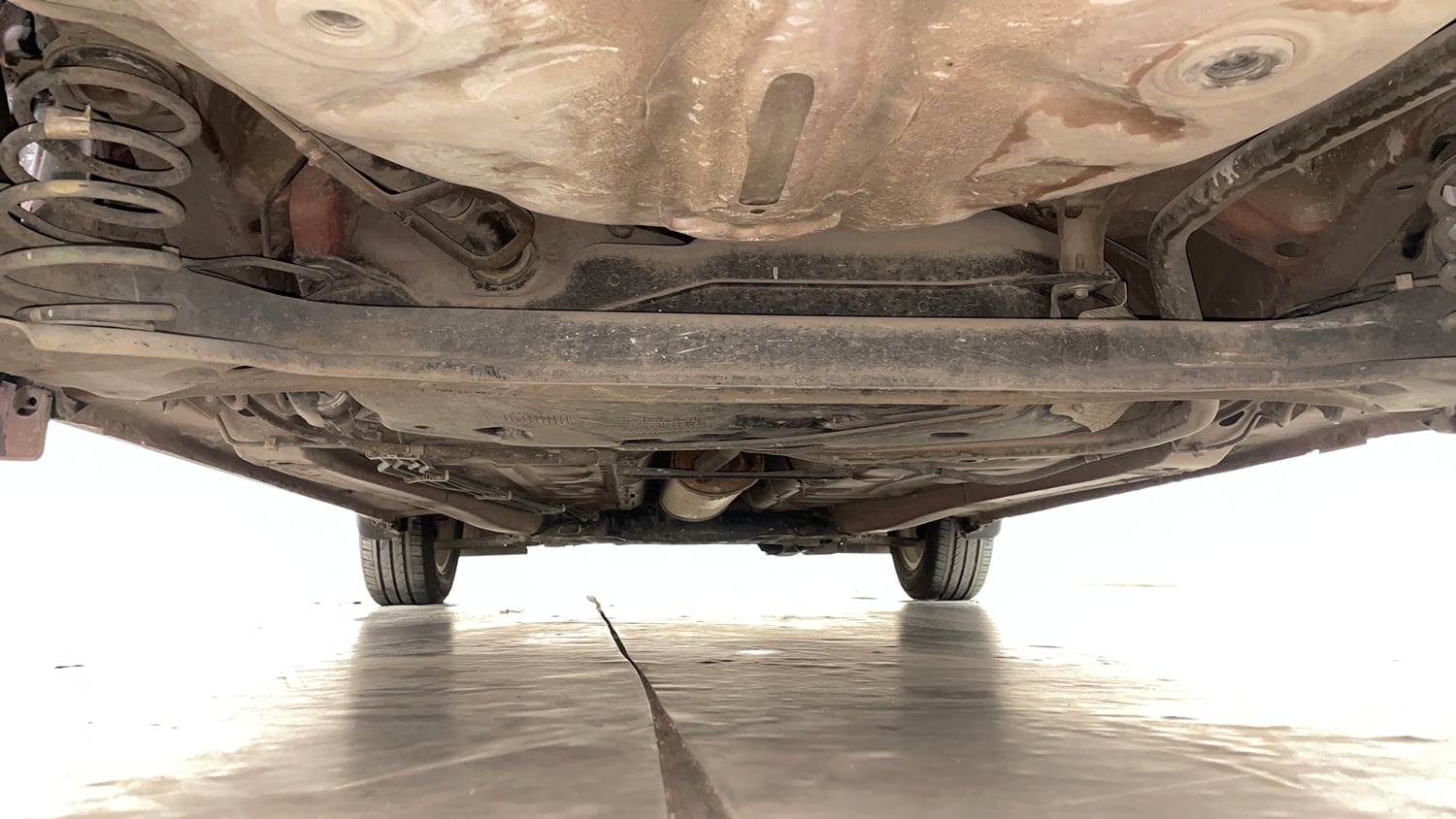 Used 2017 Maruti Suzuki Dzire ZXi AMT Petrol Automatic extra REAR UNDERBODY VIEW (TAKEN FROM REAR)