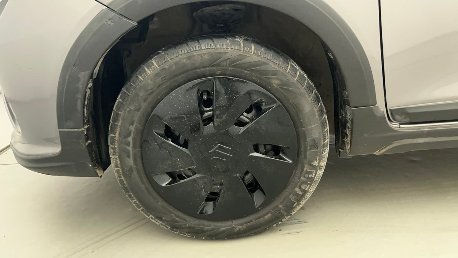 Used 2021 Maruti Suzuki Celerio X Zxi Petrol Manual tyres LEFT FRONT TYRE RIM VIEW