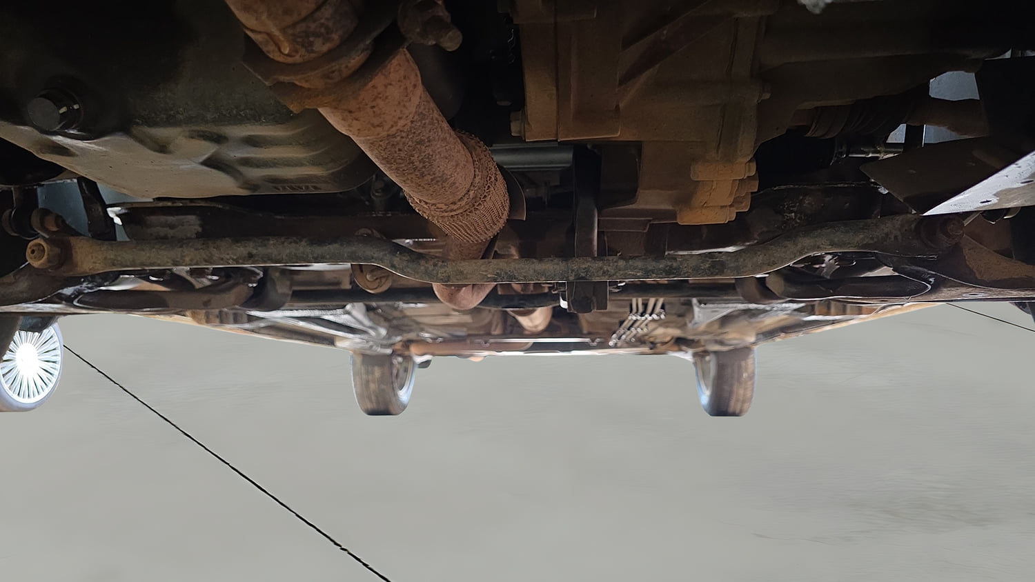 Used 2017 Tata Tiago Revotron XZ Petrol Manual extra FRONT LEFT UNDERBODY VIEW