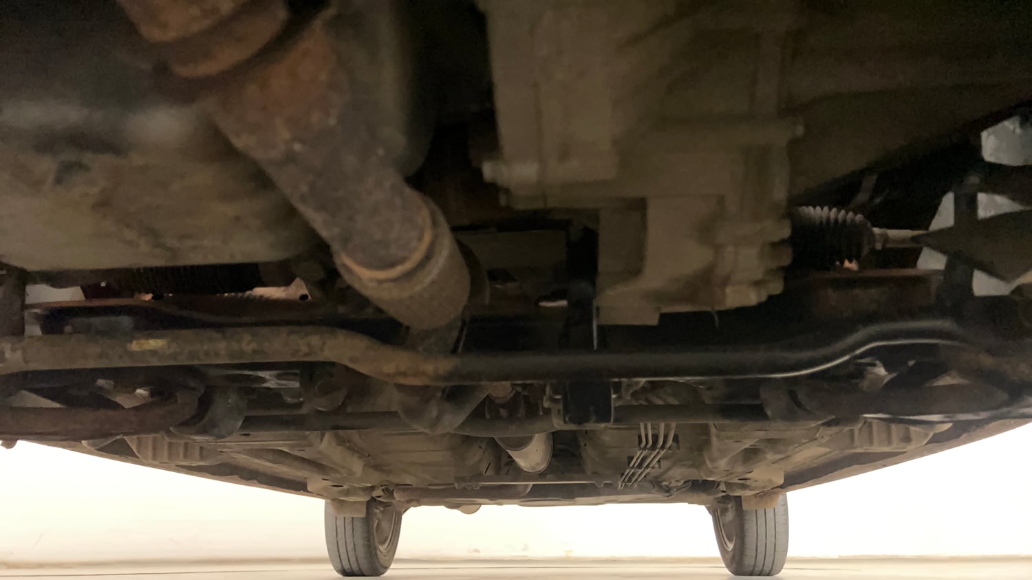 Used 2016 Tata Tiago Revotron XZ Petrol Manual extra FRONT LEFT UNDERBODY VIEW