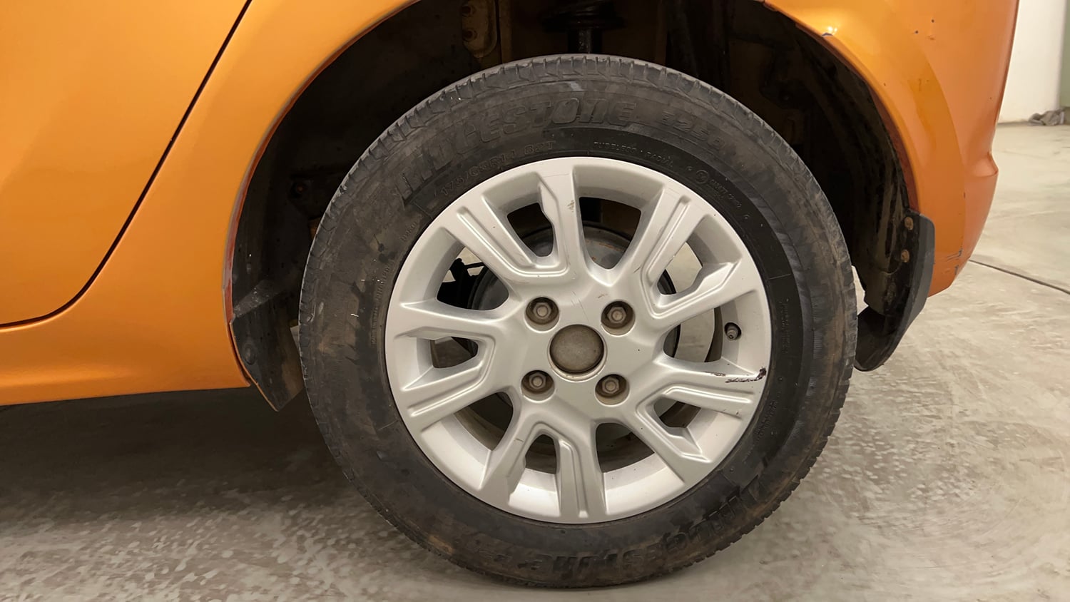 Used 2016 Tata Tiago Revotron XZ Petrol Manual tyres LEFT REAR TYRE RIM VIEW