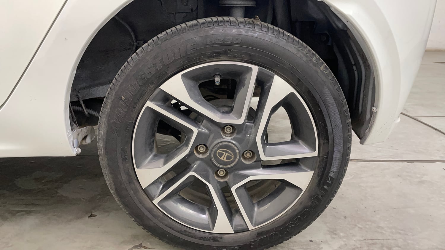 Used 2023 Tata Tiago XZ Plus Petrol Manual tyres LEFT REAR TYRE RIM VIEW