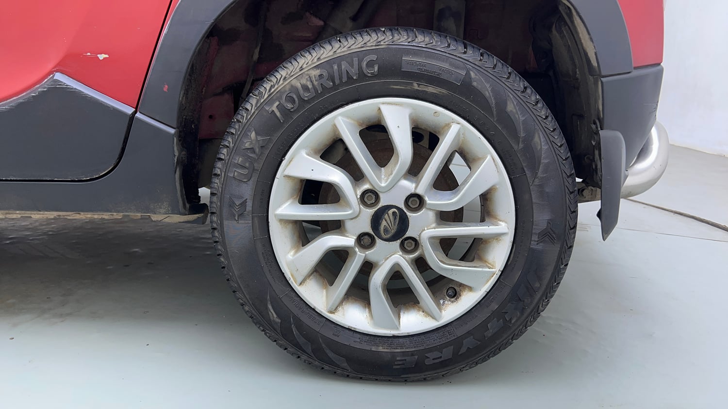 Used 2017 Mahindra KUV100 K6 6 STR Petrol Manual tyres LEFT REAR TYRE RIM VIEW